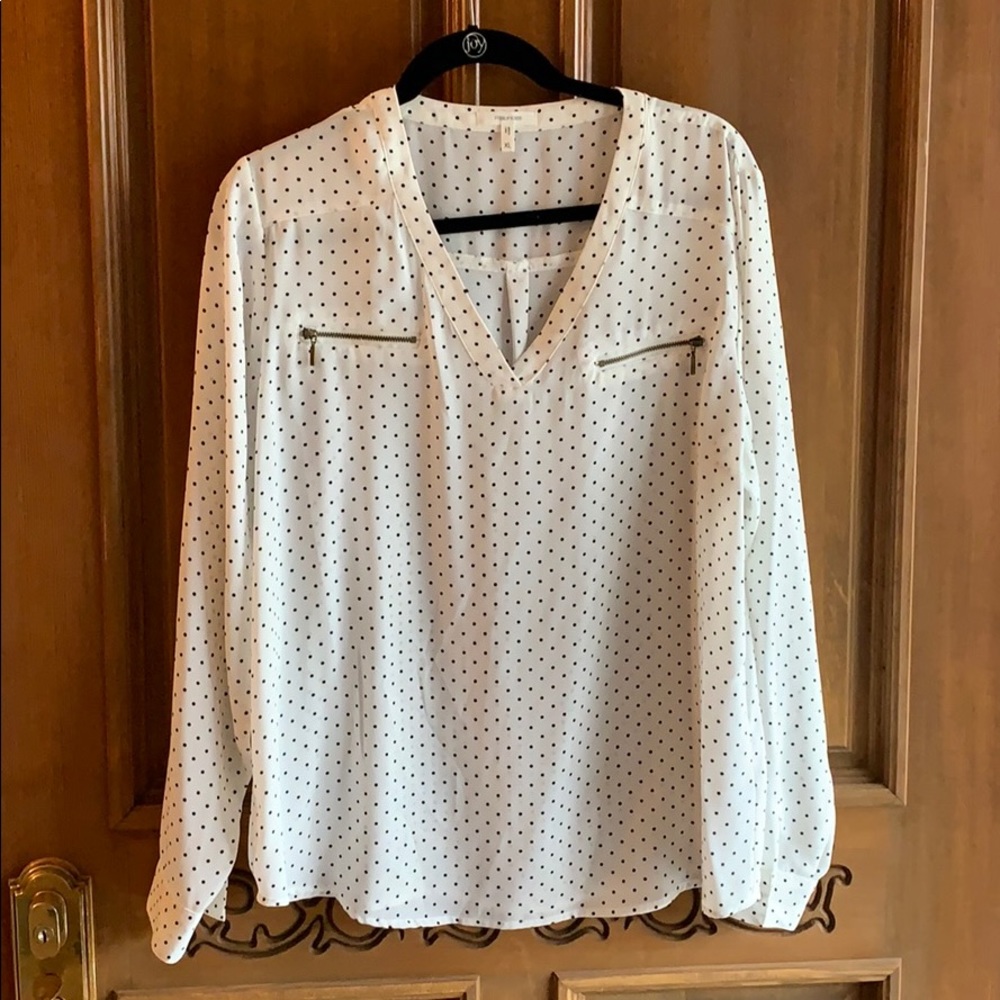 White and black polkadot blouse